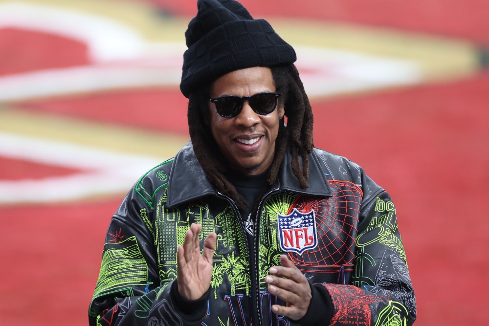 Source-feed image associated with Jay-Z Brings New York Flair to Philadelphia for Triumphant Roots Picnic Performance Featuring Jazmine Sullivan, Bilal and Meek Mill: Concert Review