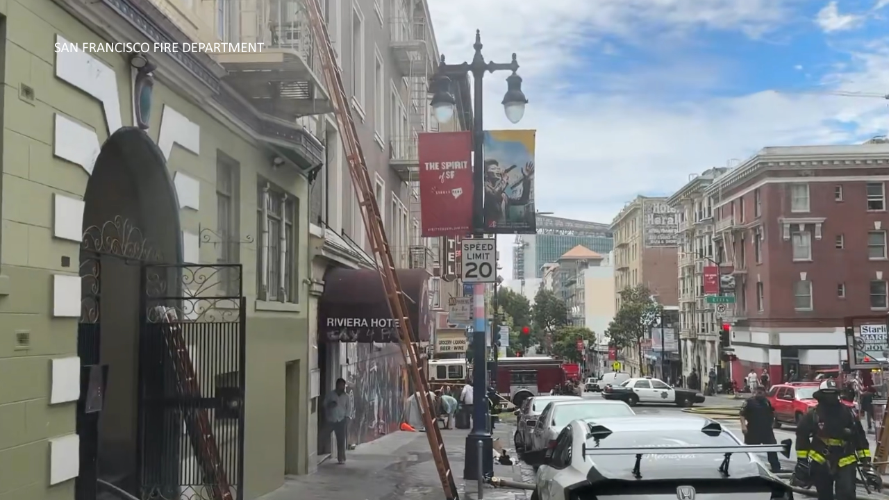 Source-feed image associated with 2-alarm fire burns at 6-story apartment building in San Francisco, officials say