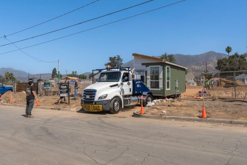 Source-feed image associated with First modular unit delivered for Altadena low-income rental complex