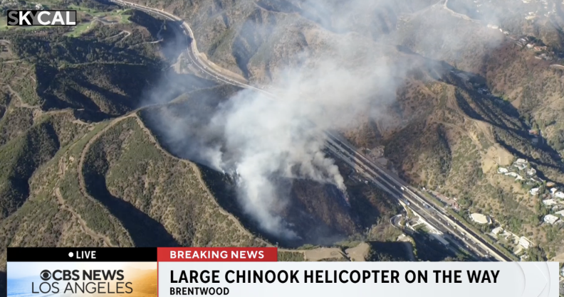 Source-feed image associated with Brush fire erupts near Getty Center, prompting evacuation warnings