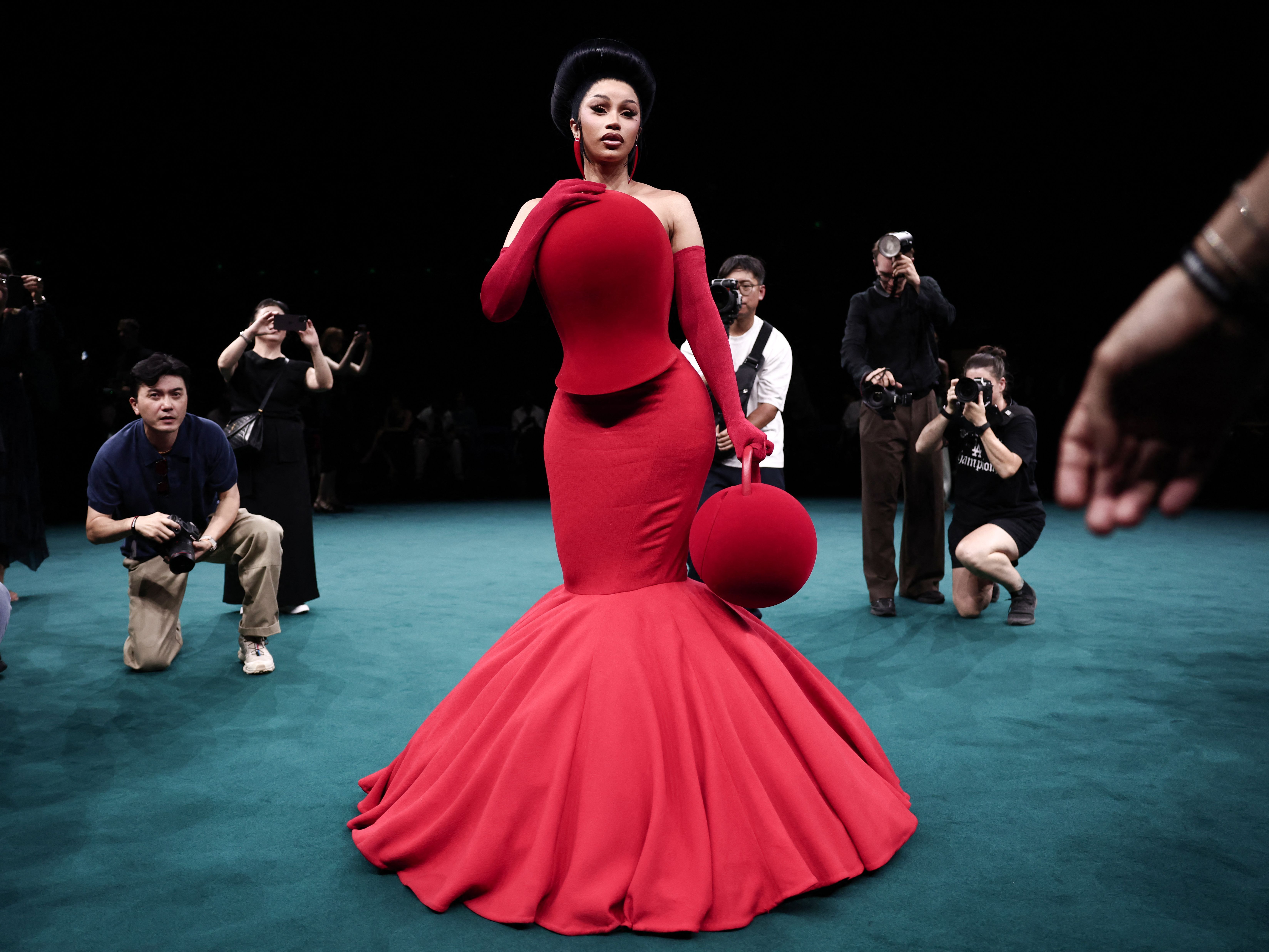 Source-feed image associated with Nobody Brings It to Couture Week Like Cardi B
