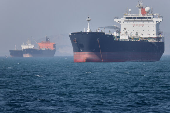 Source-feed image associated with Iran and US Trade Air Strikes After Trump Dismisses Report of Hormuz Deal