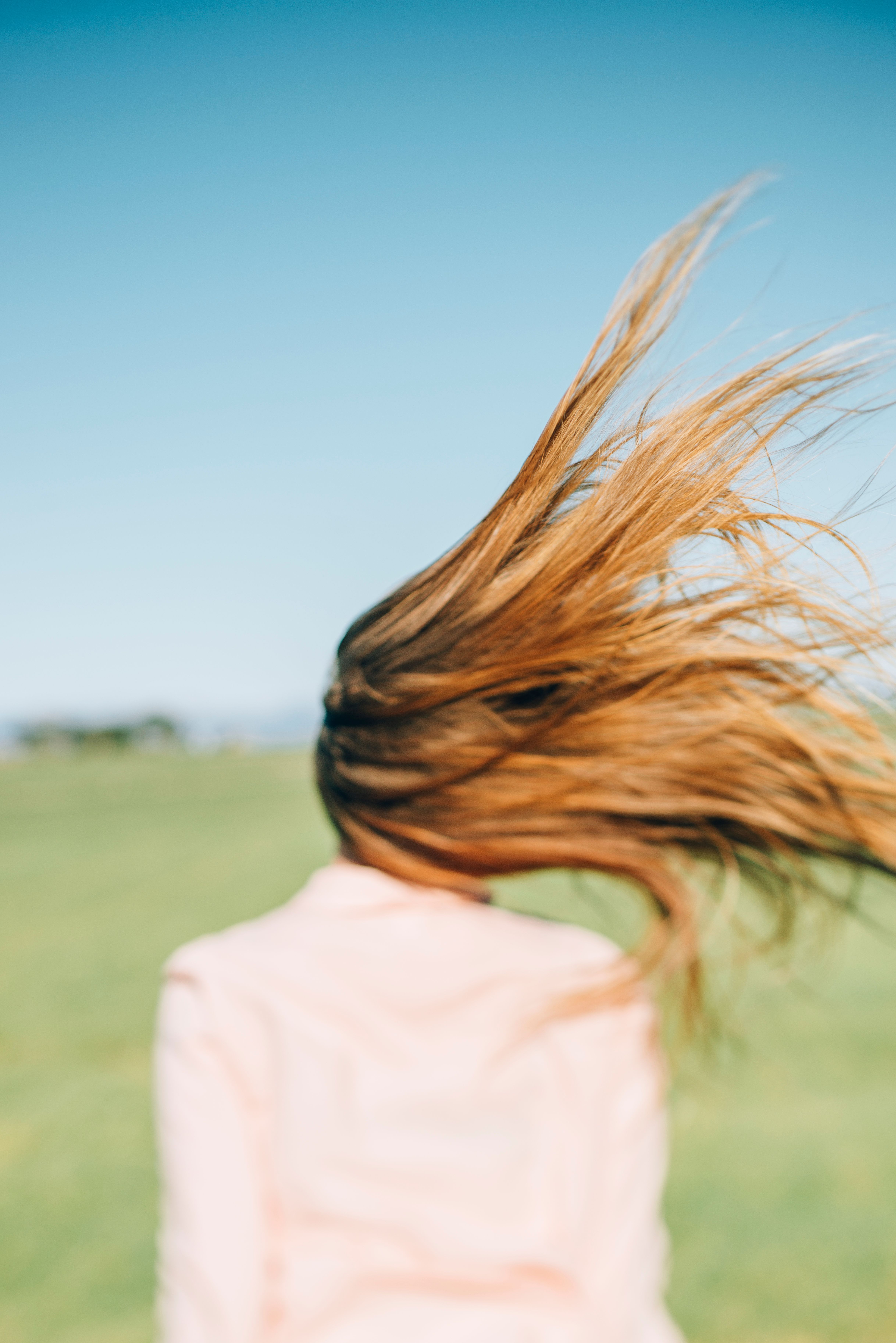 Source-feed image associated with How to Lighten Hair Without Bleach, Straight From the Pros