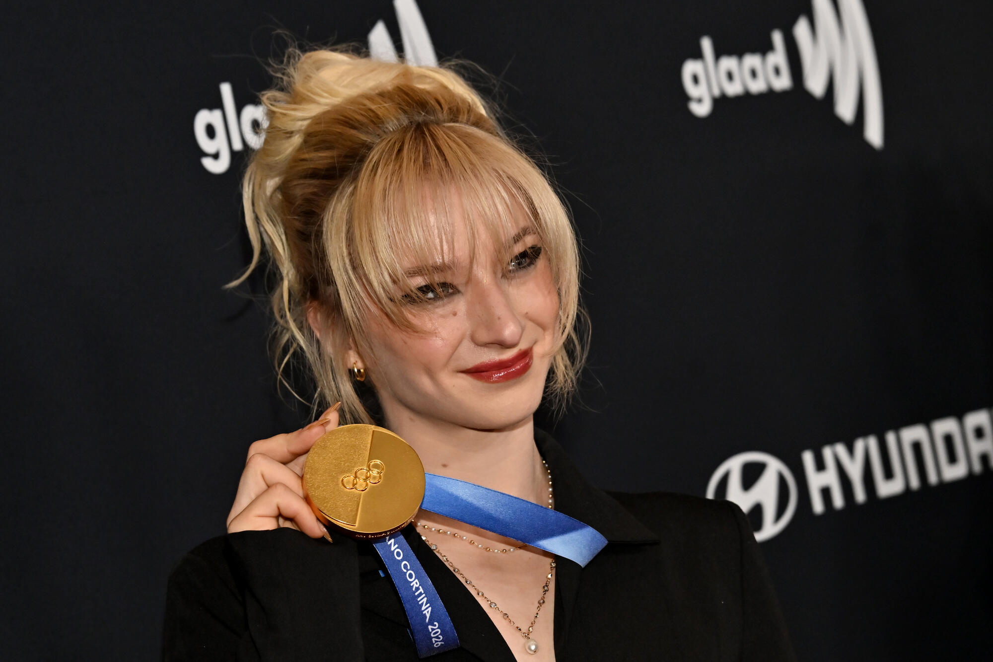 Source-feed image associated with Gold Medal Figure Skater and Magic: The Gathering Superfan Amber Glenn on Her 100,000-Card Collection and What She’d Want in Her Own ‘Secret Lair’ Set