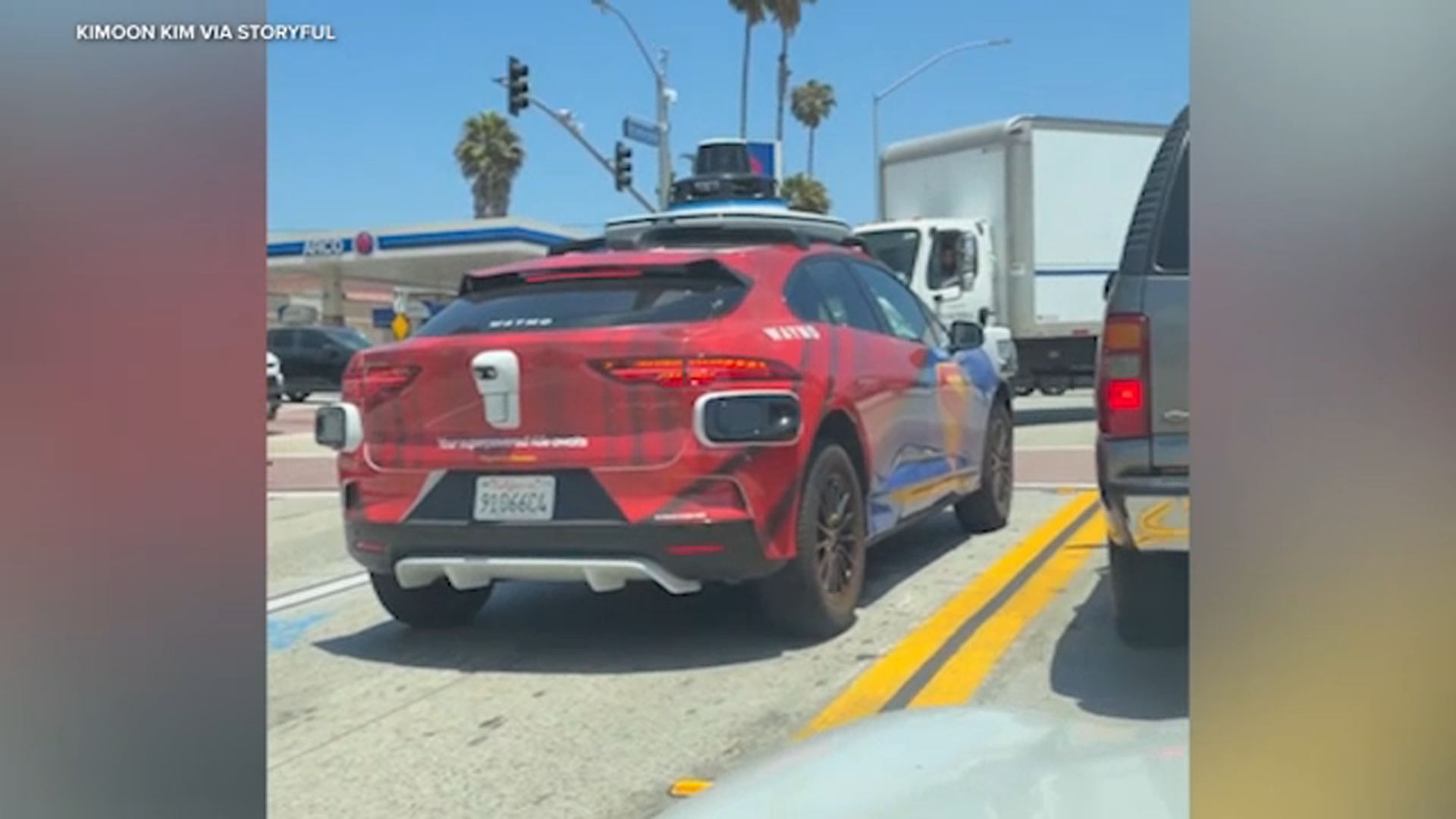 Source-feed image associated with Waymo car caught driving in wrong lane amid World Cup traffic in LA