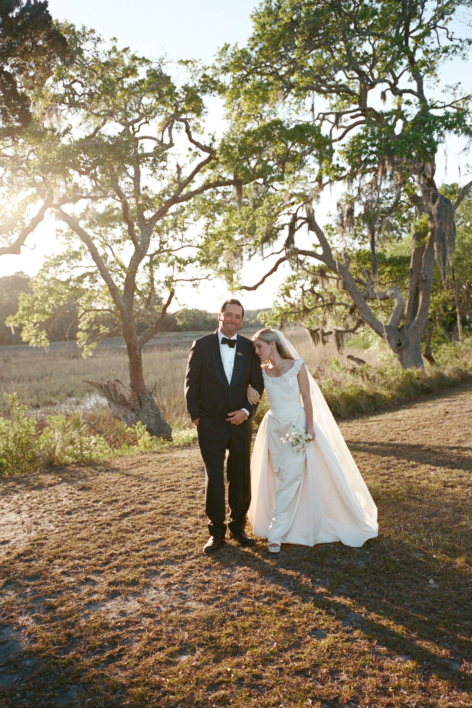 Source-feed image associated with The Bride Wore a Vintage ’90s Dress and a Belgian Lace Veil to Marry Underneath South Carolina Oaks