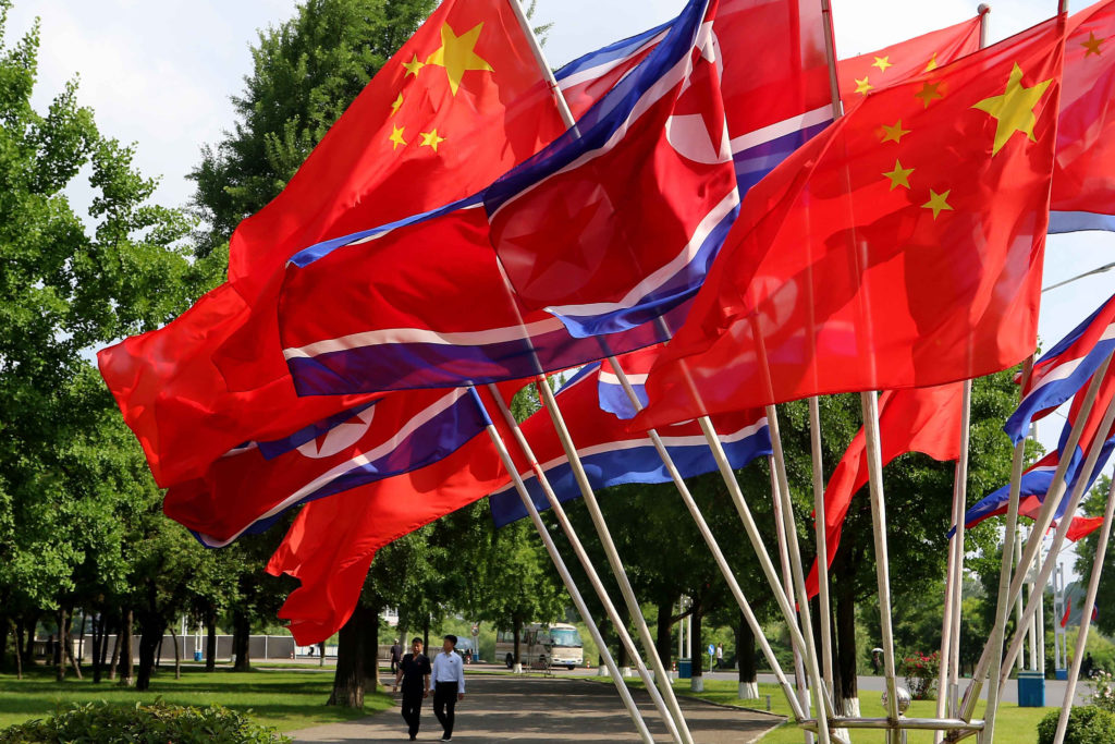 Source-feed image associated with Xi and Kim express hopes for greater ties between China and North Korea