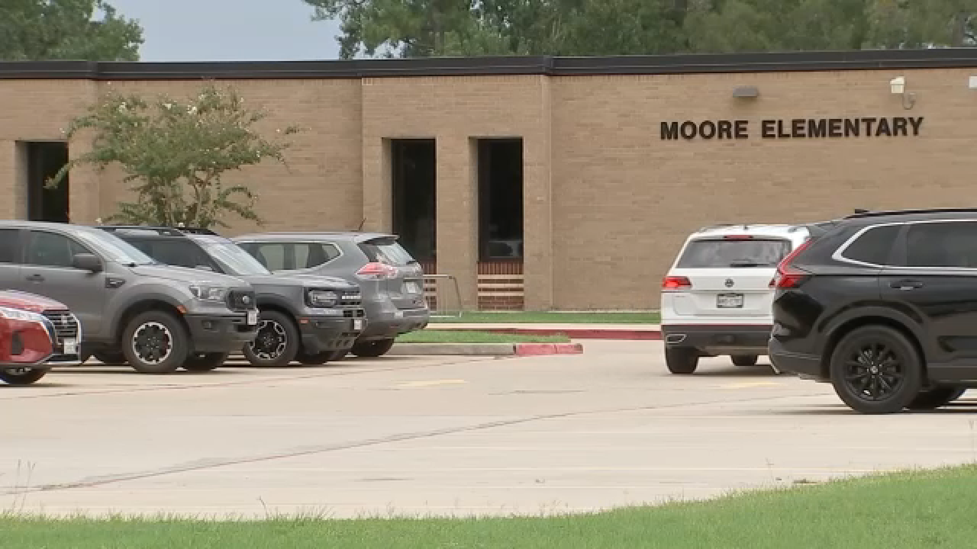 Source-feed image associated with Cy-Fair ISD mother charged with hitting her son and threatening to shoot up Moore Elementary, court records show
