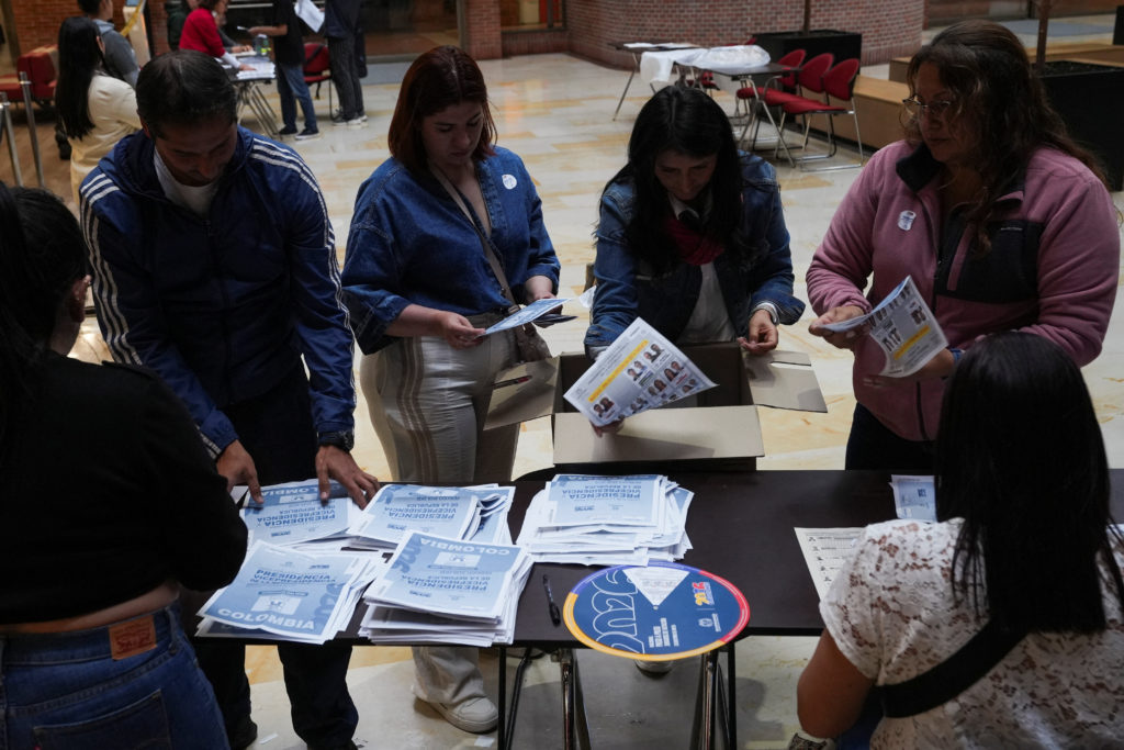 Source-feed image associated with Polls close in Colombia vote with Espriella and Cepeda advancing to runoff