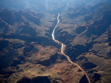 Source-feed image associated with Body found in Grand Canyon was missing hiker, wife says, bringing flood death toll to 3