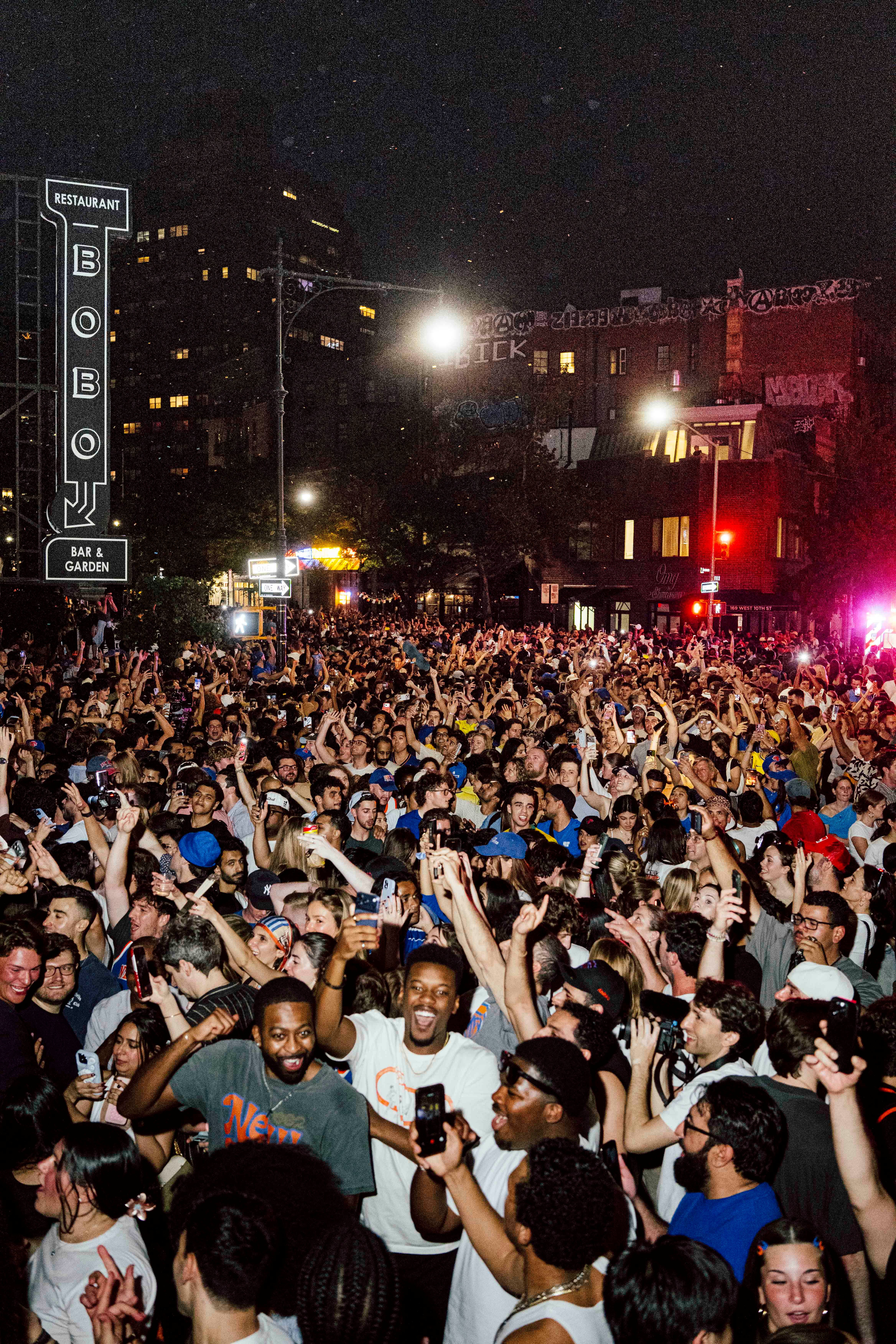 Source-feed image associated with Joyous Scenes From the Streets of Manhattan as the New York Knicks Become NBA Champions