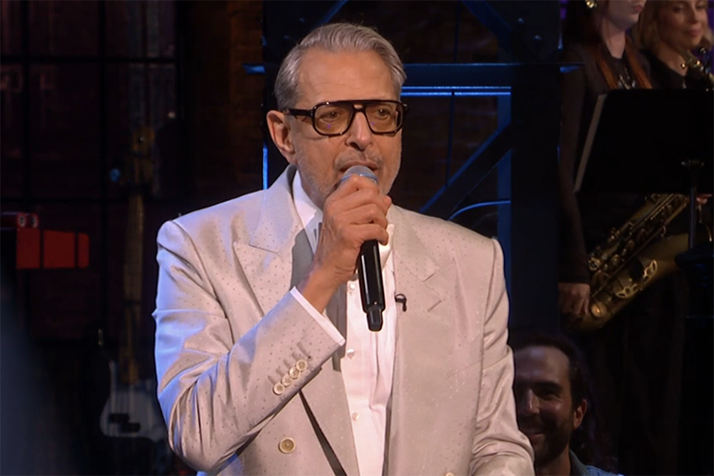 Source-feed image associated with Jeff Goldblum Performs a Jazz Number to Open ‘SNL U.K.’ Season 2: ‘Hoping You’ll Like Me More Than Nando’s or Marmite’