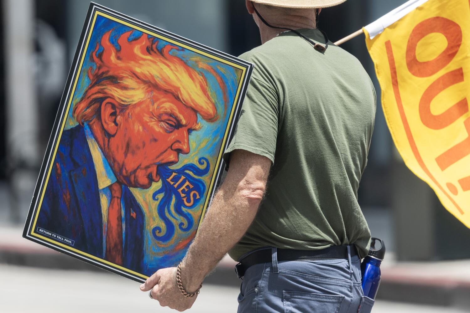 Source-feed image associated with 'It feels like it never ends — the evil': Pasadena demonstrators protest ICE shootings