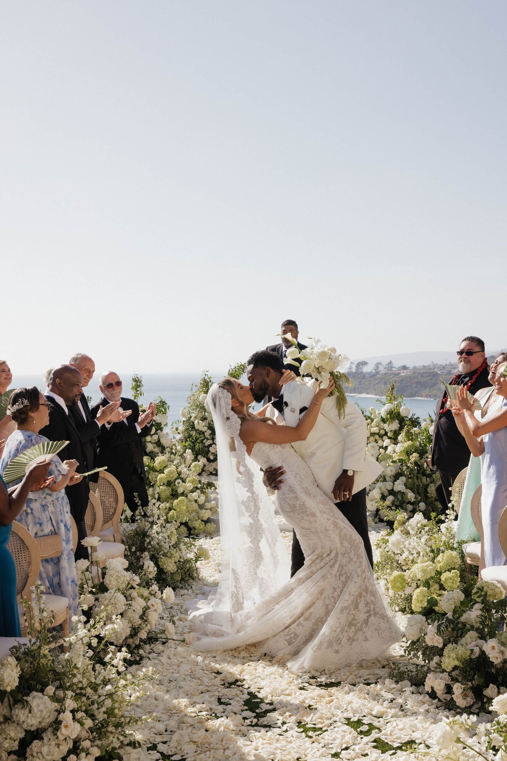 Source-feed image associated with Juju Smith-Schuster and Laura Kruk’s Coastal California Wedding Was Filled With Florals and Samoan Traditions