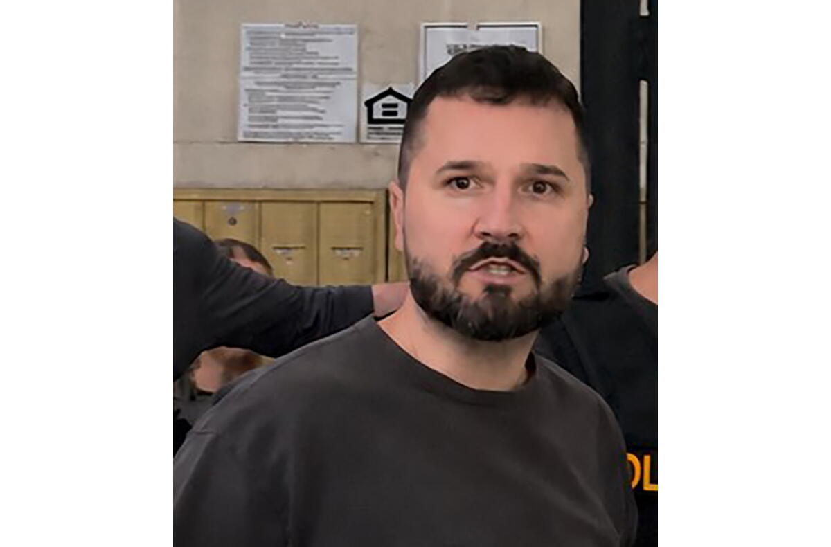 Source-feed image associated with Christian podcaster arrested in Los Angeles on suspicion of threatening President Trump