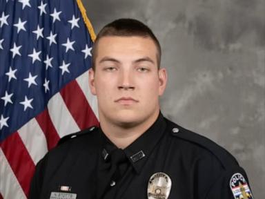 Source-feed image associated with Ex-cop charged with manslaughter in fatal shooting of naked man