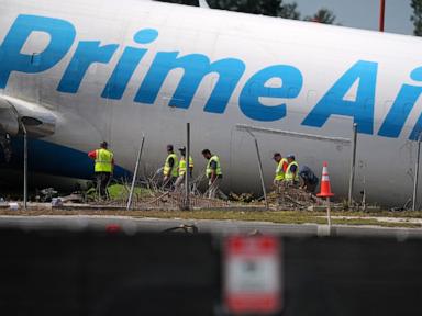 Source-feed image associated with Pilot of cargo plane that careened off Miami runway warned it was coming in too fast