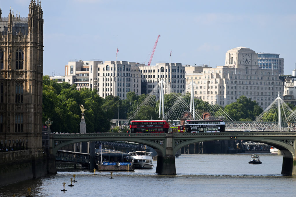 Source-feed image associated with Police boat crashes into central London bridge, sending officers into River Thames