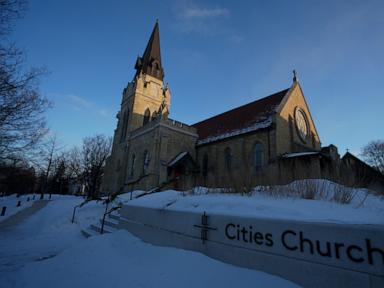 Source-feed image associated with ICE protesters who interrupted church service won't face state charges: Prosecutor