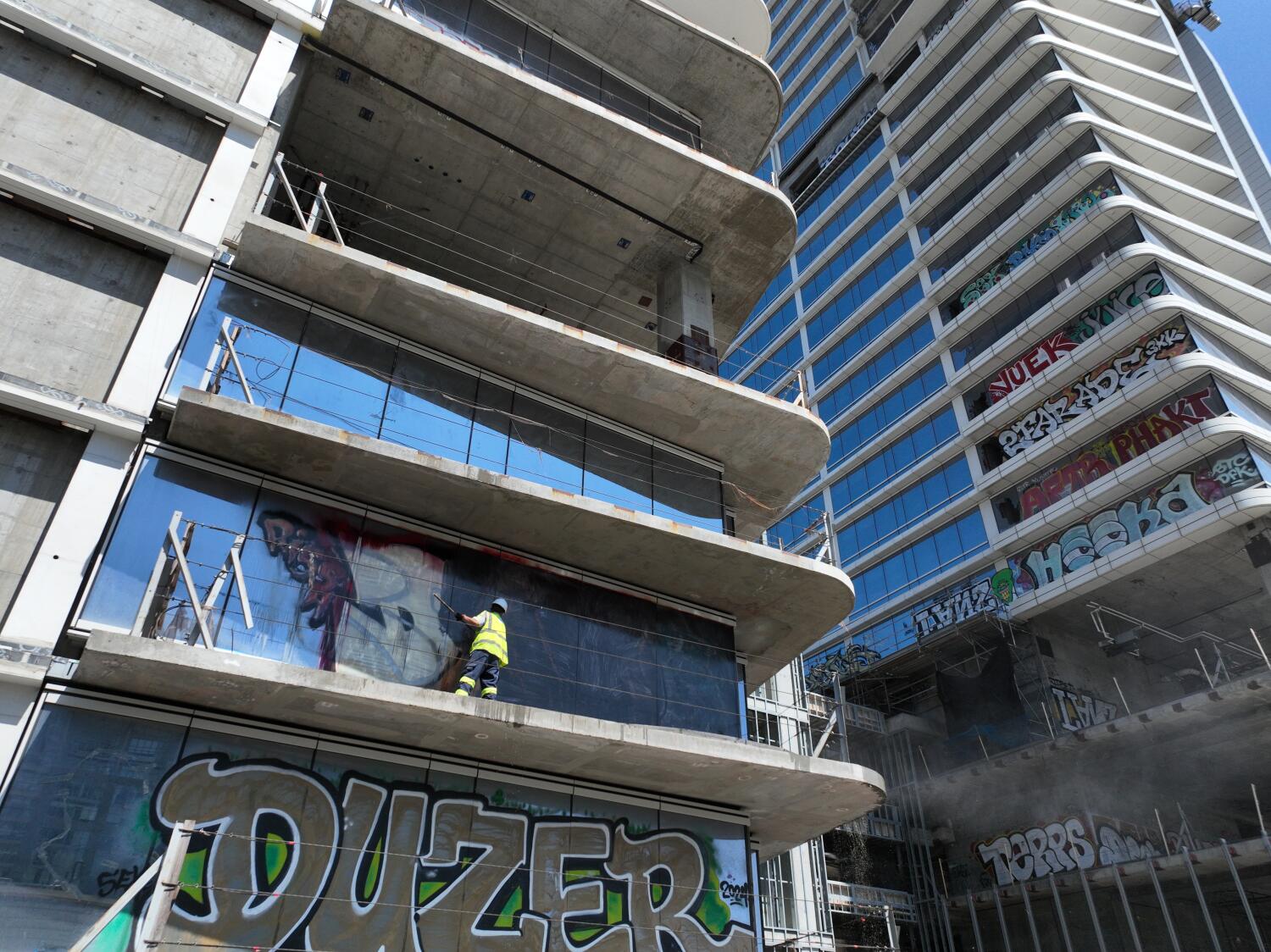 Source-feed image associated with Graffiti towers cleanup begins