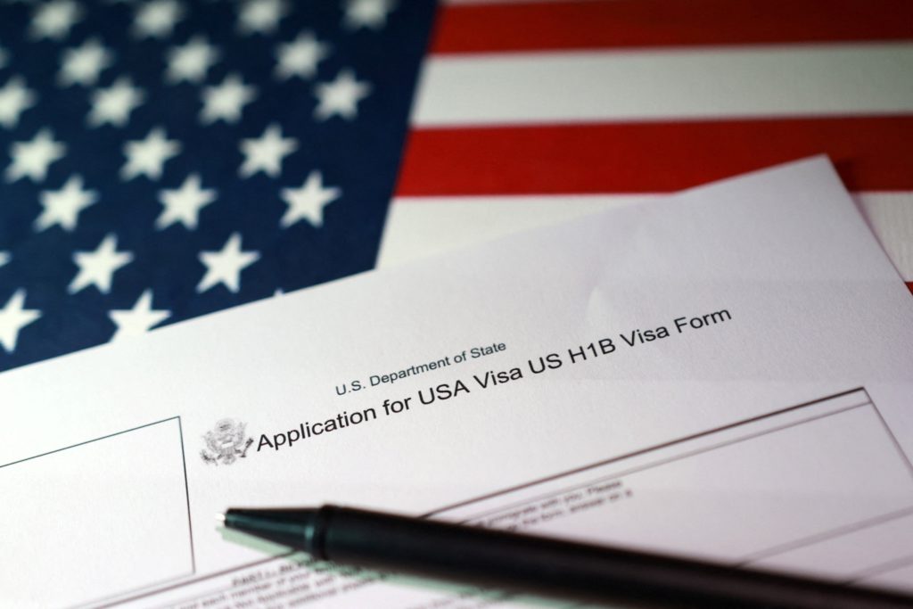 Source-feed image associated with Federal judge strikes down Trump's $100,000 fee on new H-1B visas for high-skilled workers
