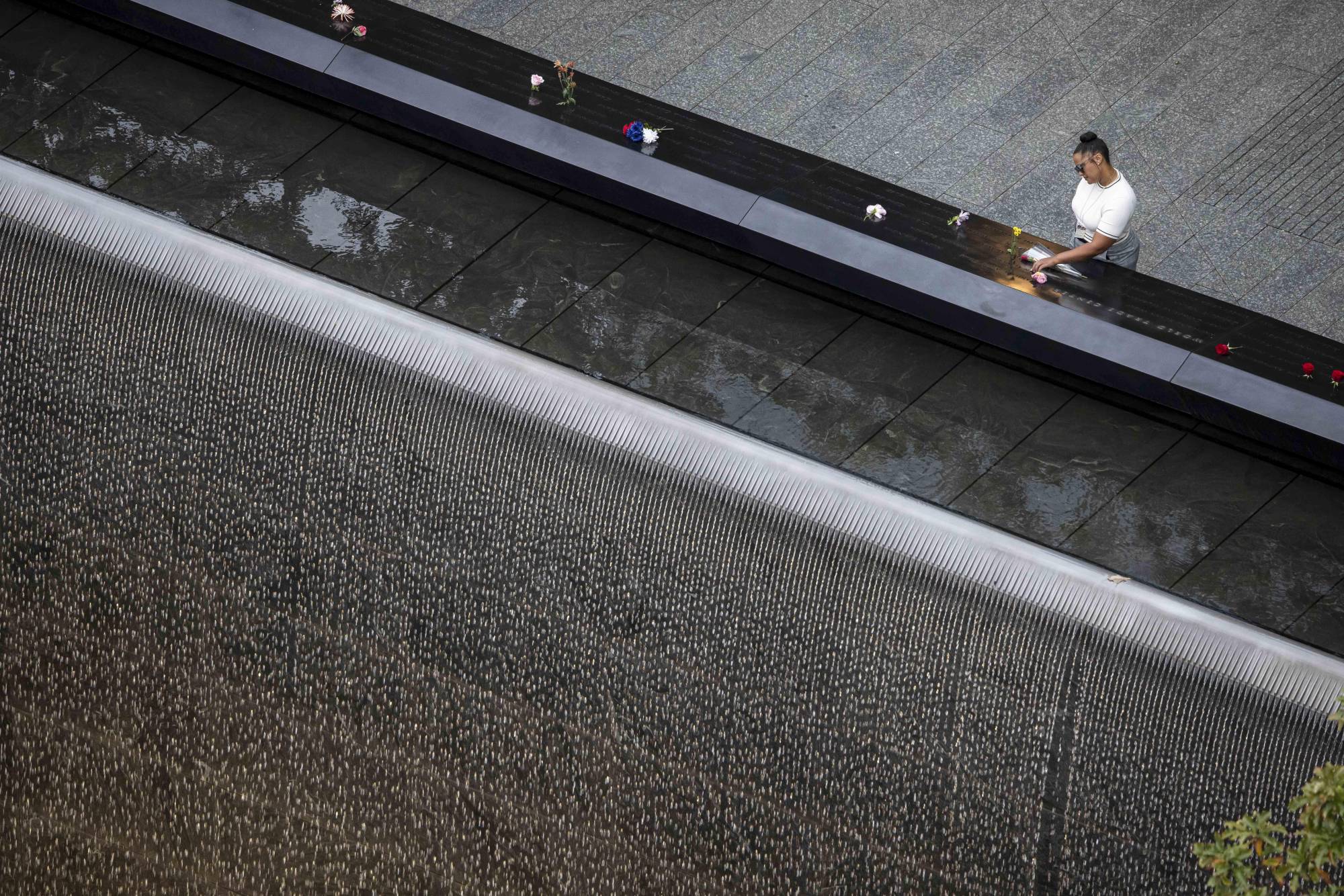Source-feed image associated with In Photos: Remembering the Sept. 11 Attacks, 25 Years Later