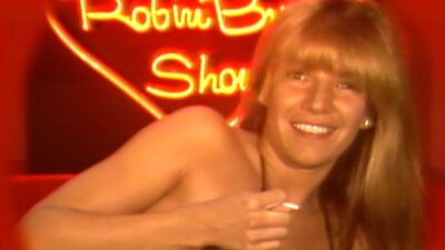 Source-feed image associated with ‘Bang My Box: The Robin Byrd Story’ Review: The Mistress of Late-Night Cable Public-Access Sex-Show Kitsch Gets Her Own Bangin’ Documentary