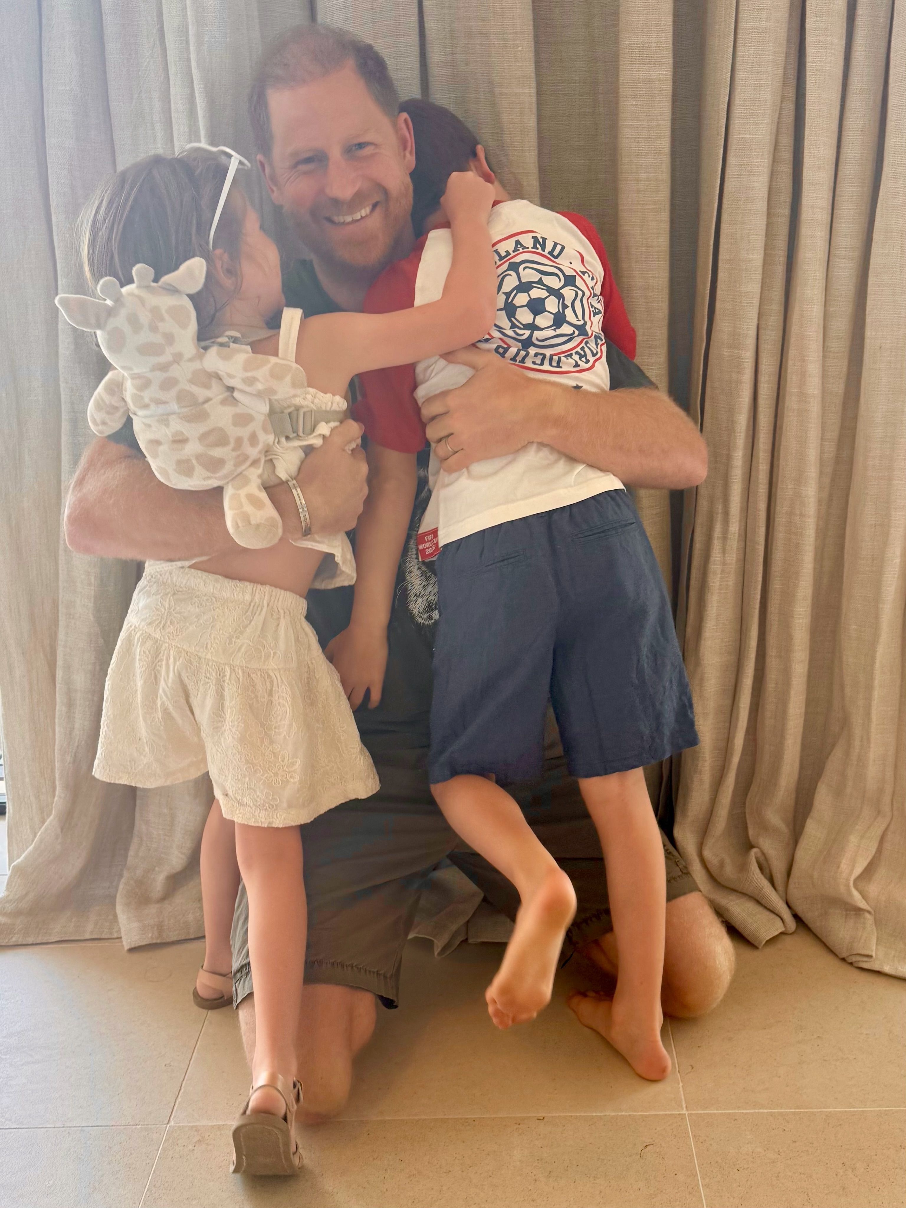 Source-feed image associated with Meghan Markle Shares a Rare Glimpse of Children Archie and Lilibet in a Sweet Father’s Day Post