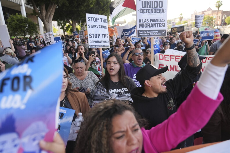 Source-feed image associated with Federal immigration raids in LA started a year ago. They left a permanent mark on many