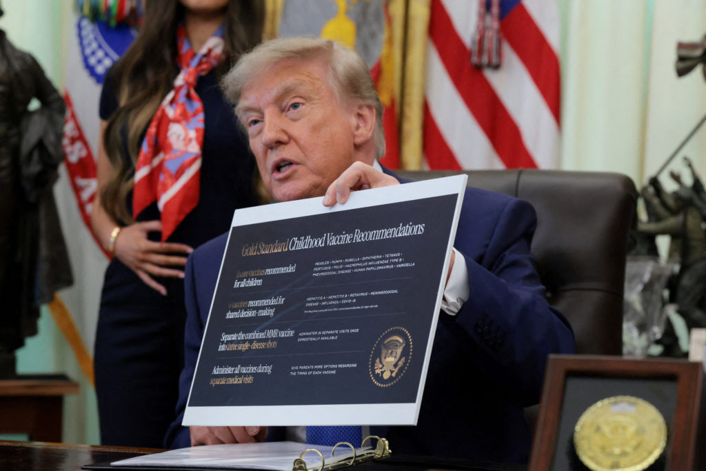 Source-feed image associated with News Wrap: Trump signs order calling for MMR vaccine split into 3 shots