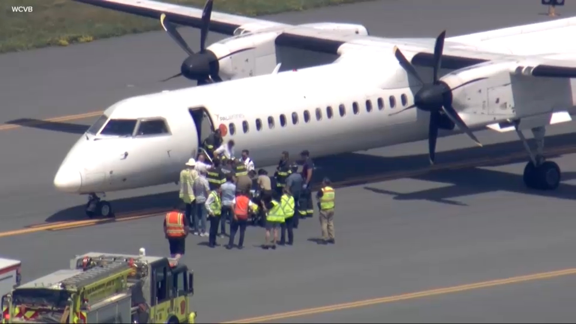 Source-feed image associated with Air Canada Flight AC7664 from Newark Airport diverts to Boston after captain suffers medical episode