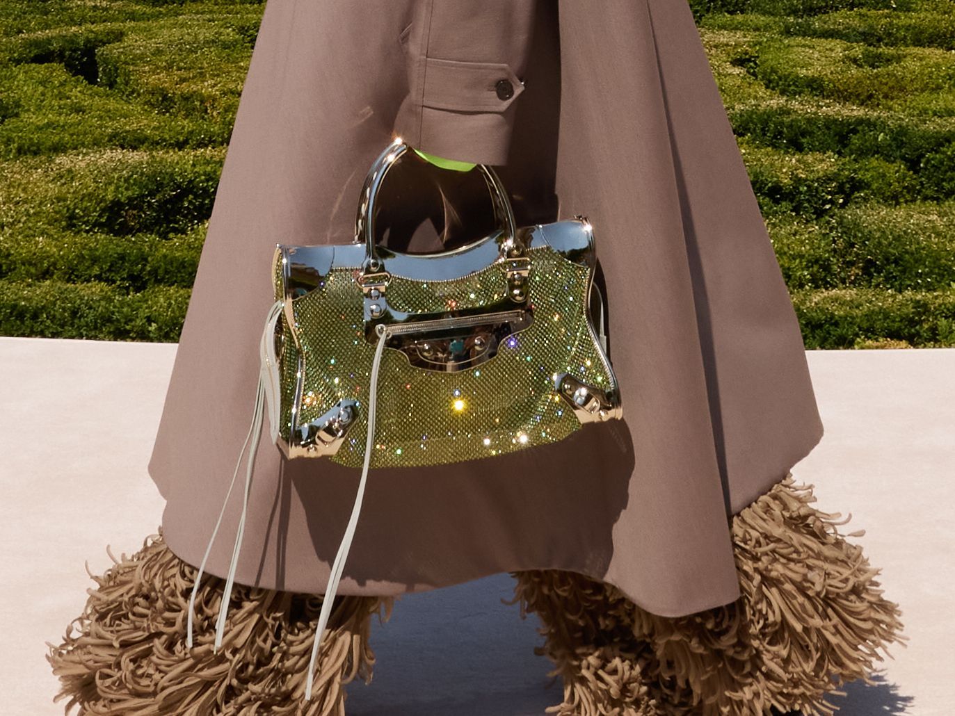 Source-feed image associated with At Balenciaga, the Infamous City Bag Gets the Couture Treatment