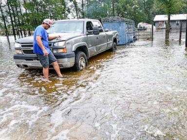 Source-feed image associated with Edouard, now a tropical depression, drenches Texas with flash flooding and downed trees