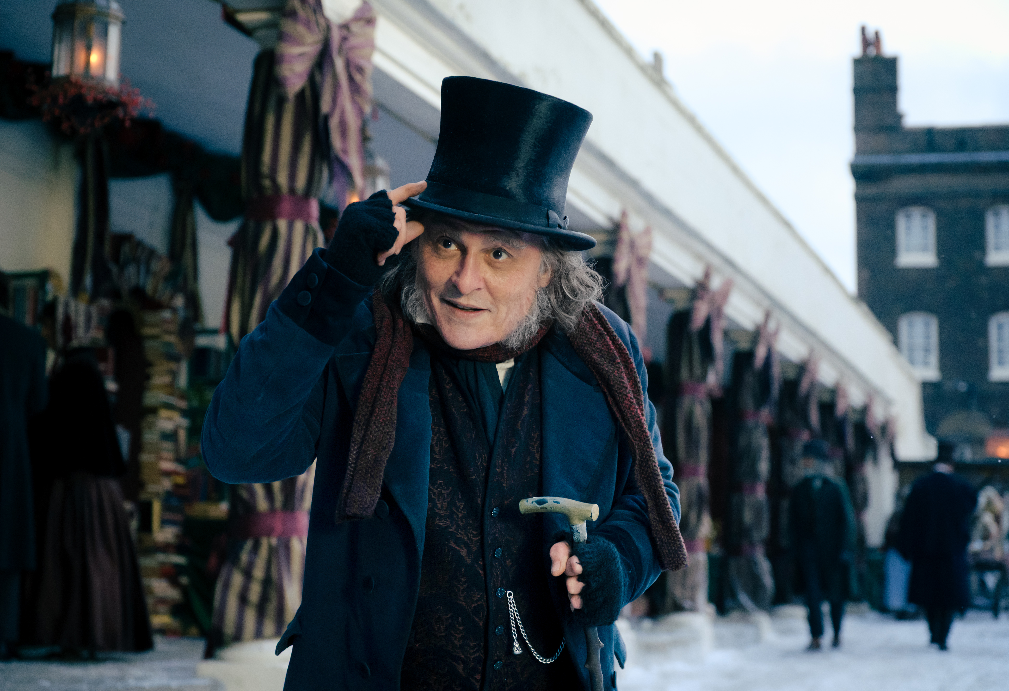Source-feed image associated with ‘Ebenezer’ Trailer: Johnny Depp Transforms Into Grouchy, Snowball-Throwing Scrooge