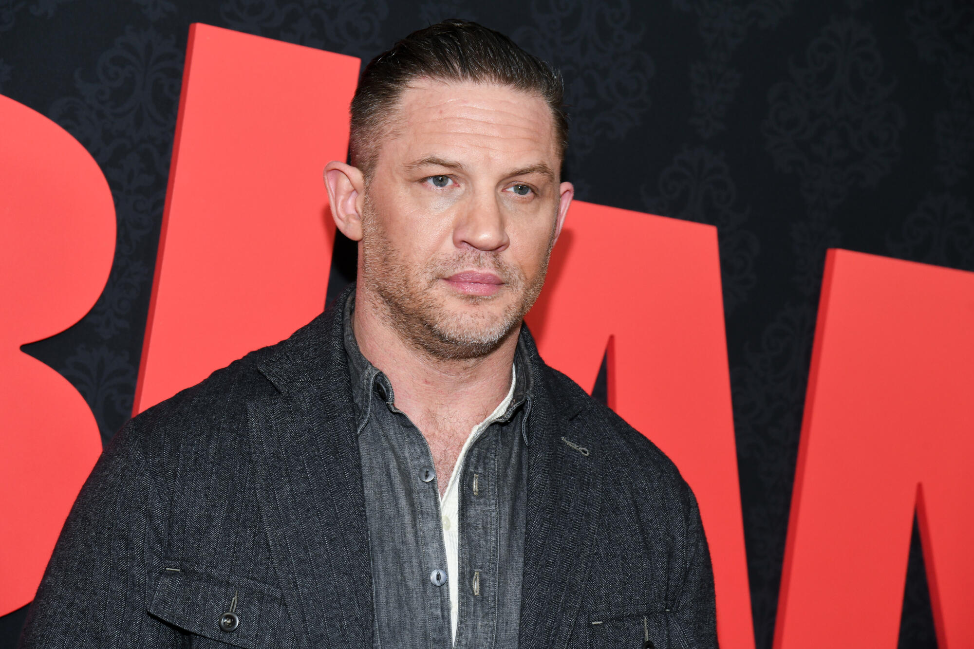 Source-feed image associated with Tom Hardy Gets X-Rated About Kathy Bates, Raps About Willem Dafoe’s Green Goblin and Recites Shakespeare on His Wild New Album