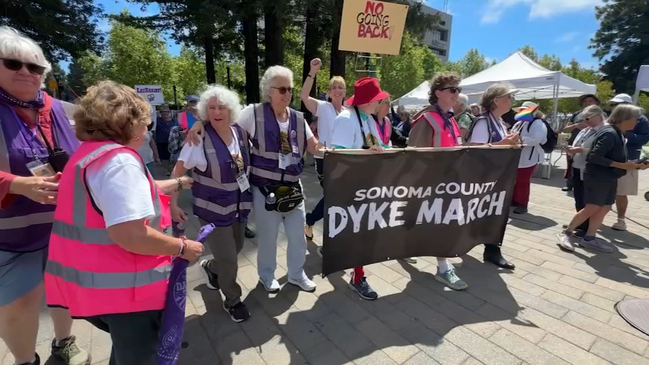 Source-feed image associated with Hundreds rally for 1st-ever Sonoma Co. Dyke March in Santa Rosa: 'We're here. We're queer!'