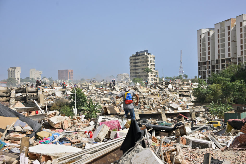 Source-feed image associated with Crews race to find survivors in mountains of rubble after Venezuela earthquakes
