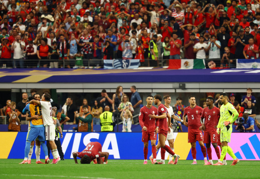 Source-feed image associated with Cristiano Ronaldo's World Cup career ends after Mikel Merino's late goal sends Spain to quarterfinals