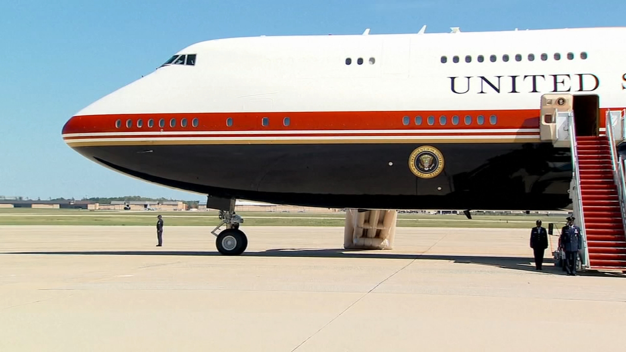 Source-feed image associated with Inflatable slide deploys on Qatari-gifted Air Force One ahead of Trump's Dallas trip