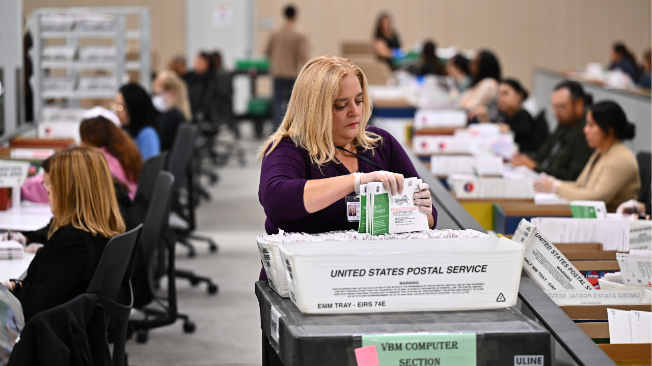 Source-feed image associated with Democratic states file new lawsuit seeking to block Trump's order limiting mail voting in midterms