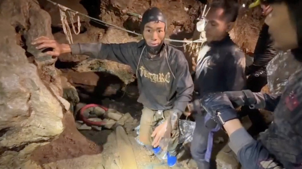 Source-feed image associated with Rescuers seek alternative route to search for remaining 2 people stranded in a flooded Laos cave