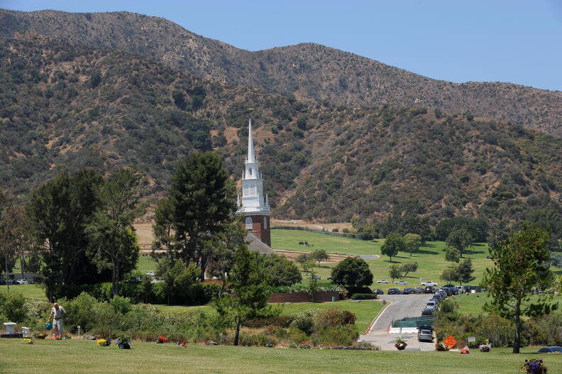 Source-feed image associated with Will Forest Lawn Drive go down to 3 lanes? A last-minute bill change aims to block the project