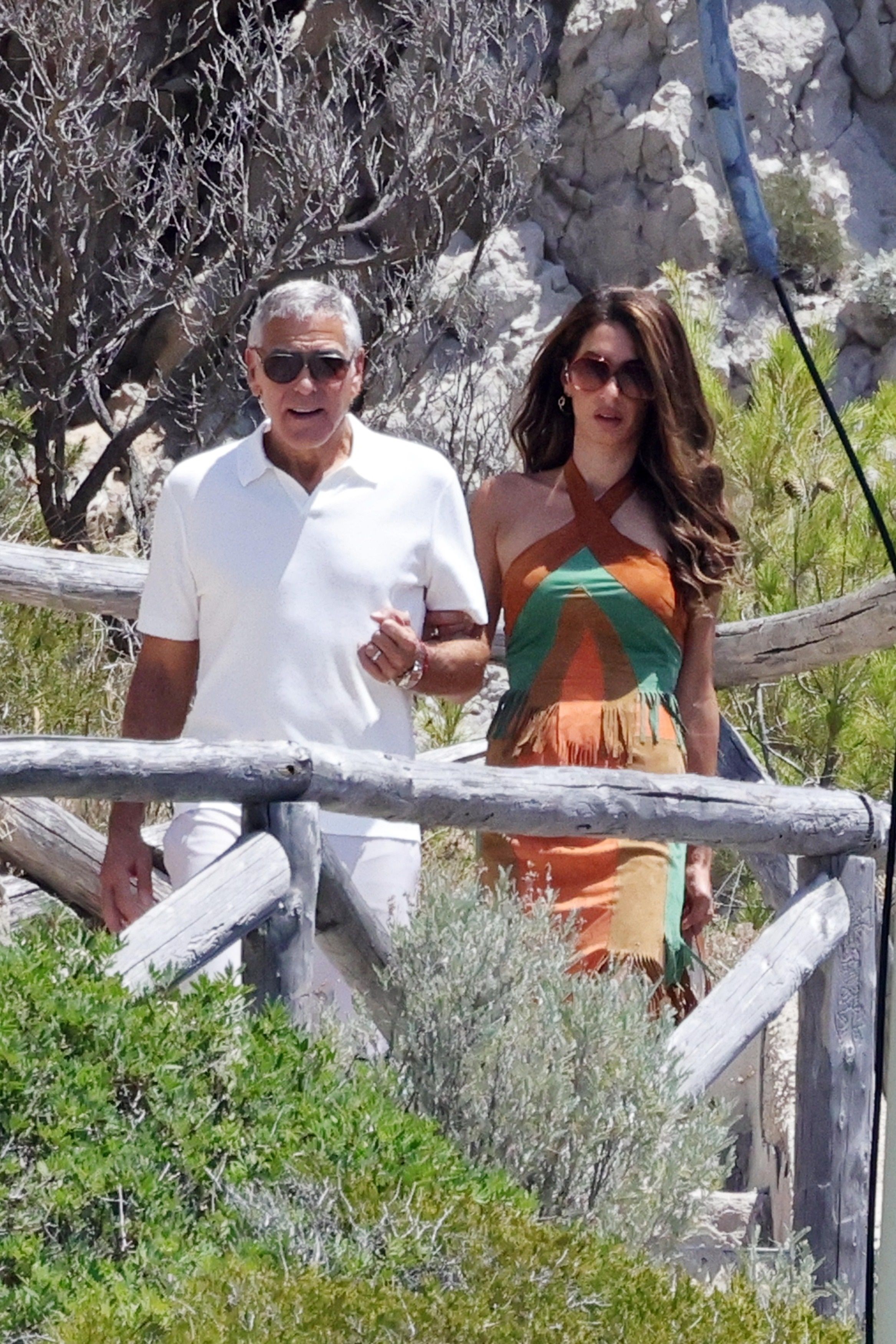 Source-feed image associated with Amal Clooney Approves of Suede for Summer—As Long As It’s Vintage Mugler