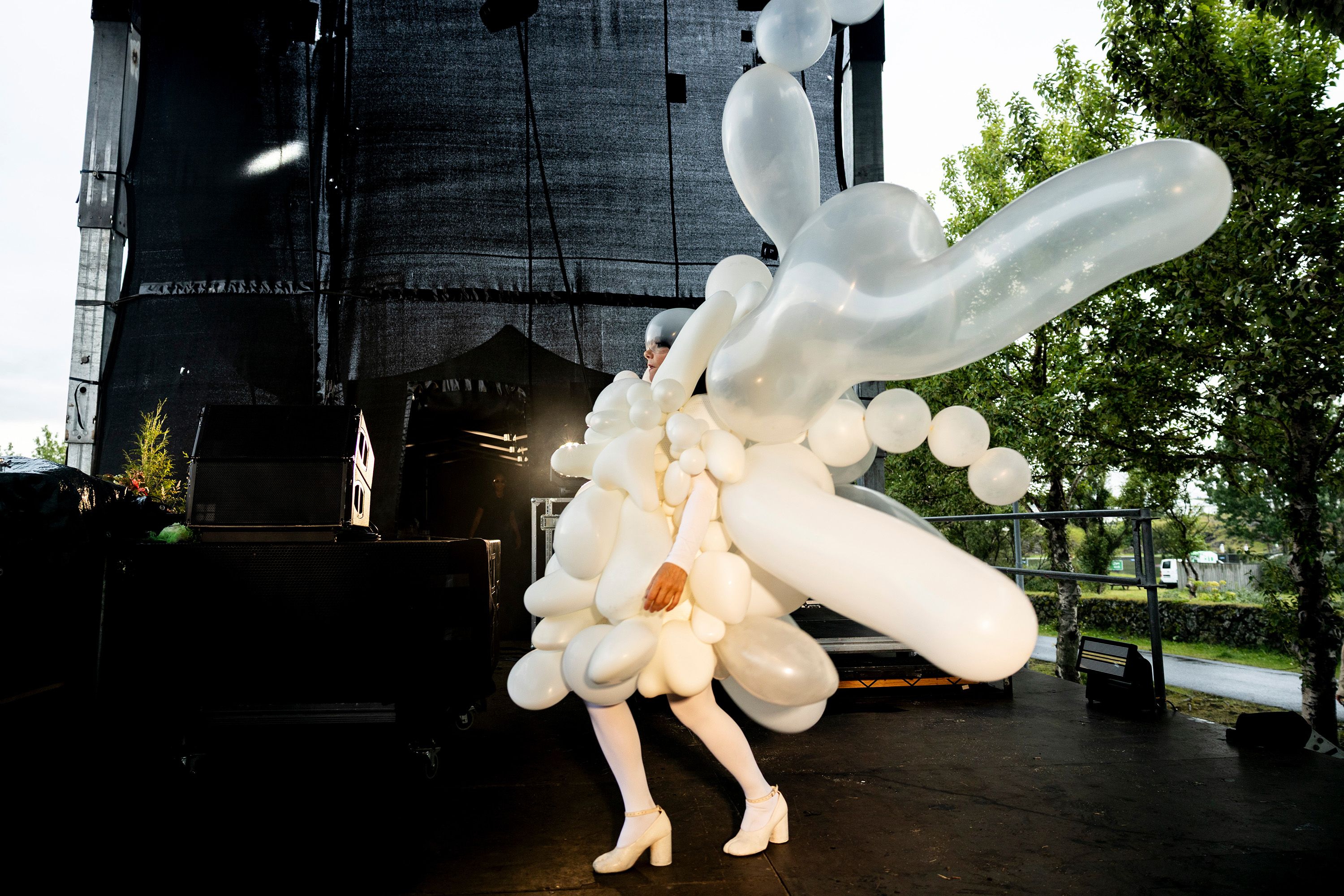 Source-feed image associated with The Story Behind Björk’s Robert Wun Balloon Look—and Her Solar Eclipse Rave in Iceland