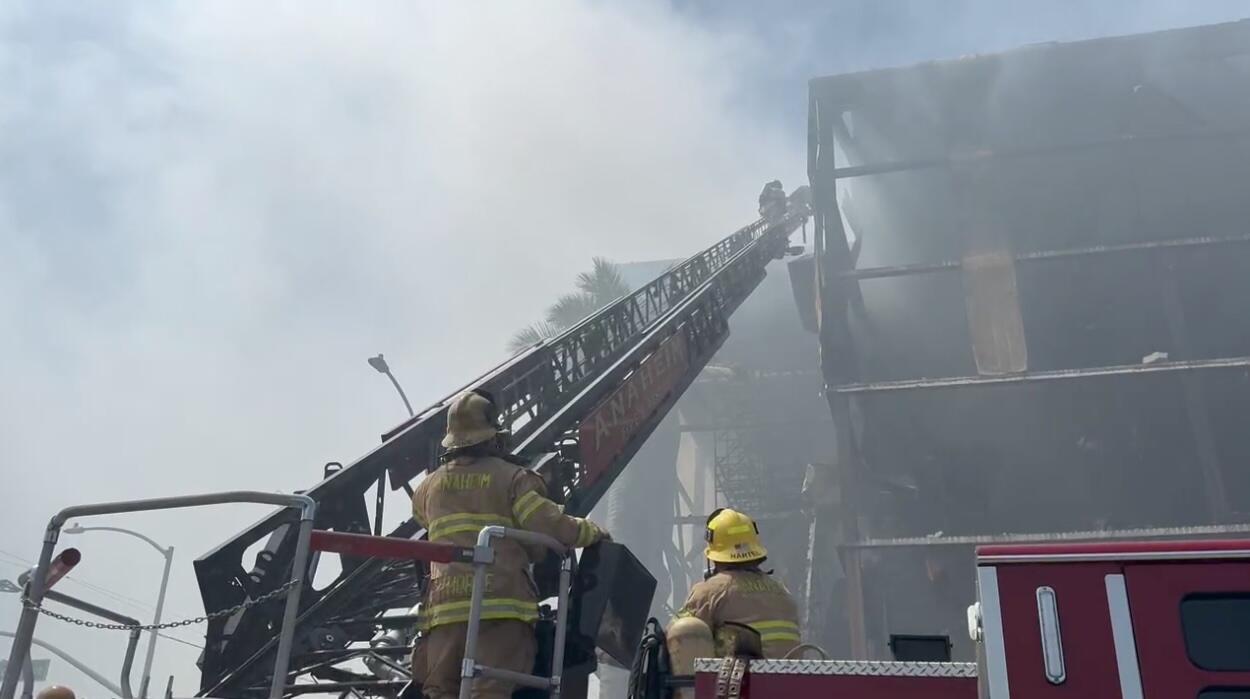 Source-feed image associated with 'This crisis is not over.' Boyle Heights fire keeps burning as officials warn of polluted air