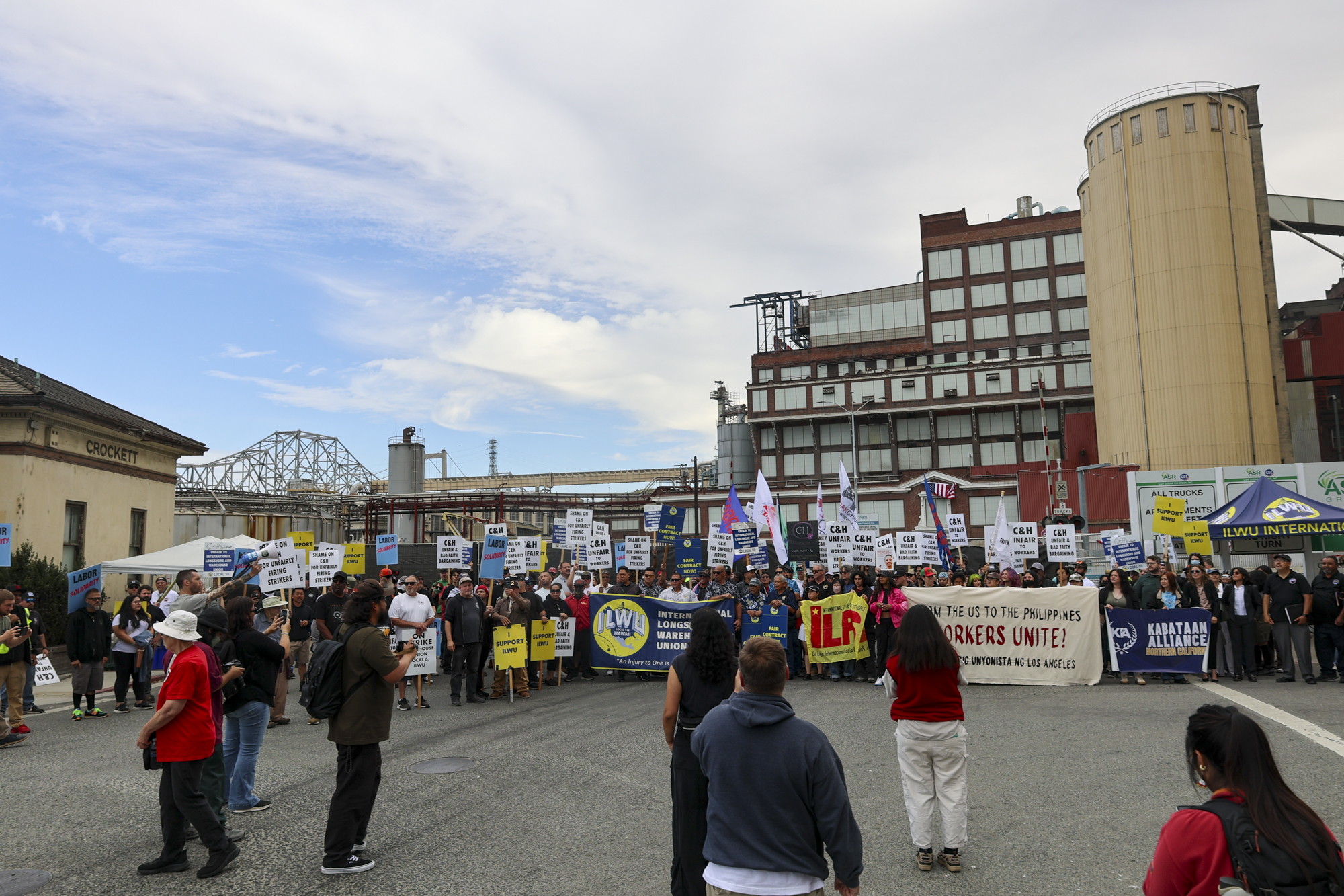 Source-feed image associated with Arrests, Injuries at C&H Sugar Protest as Strike at Crockett Refinery Enters Sixth Week