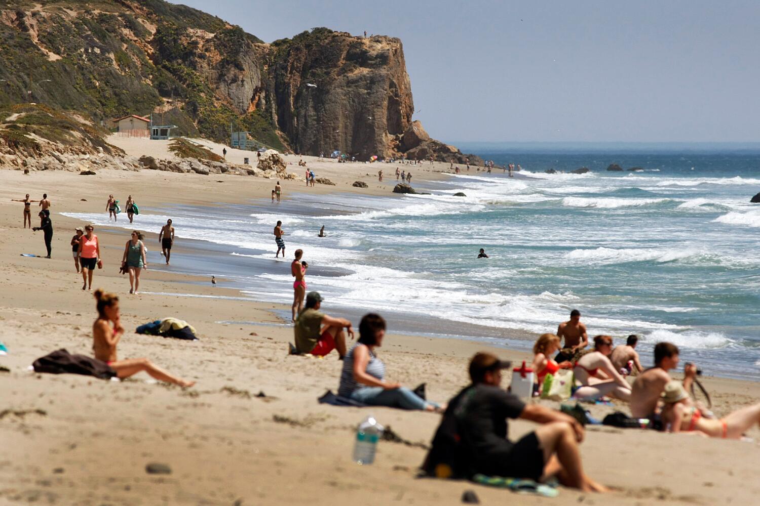 Source-feed image associated with High surf and severe erosion trigger Point Dume closures and Long Beach surge warnings