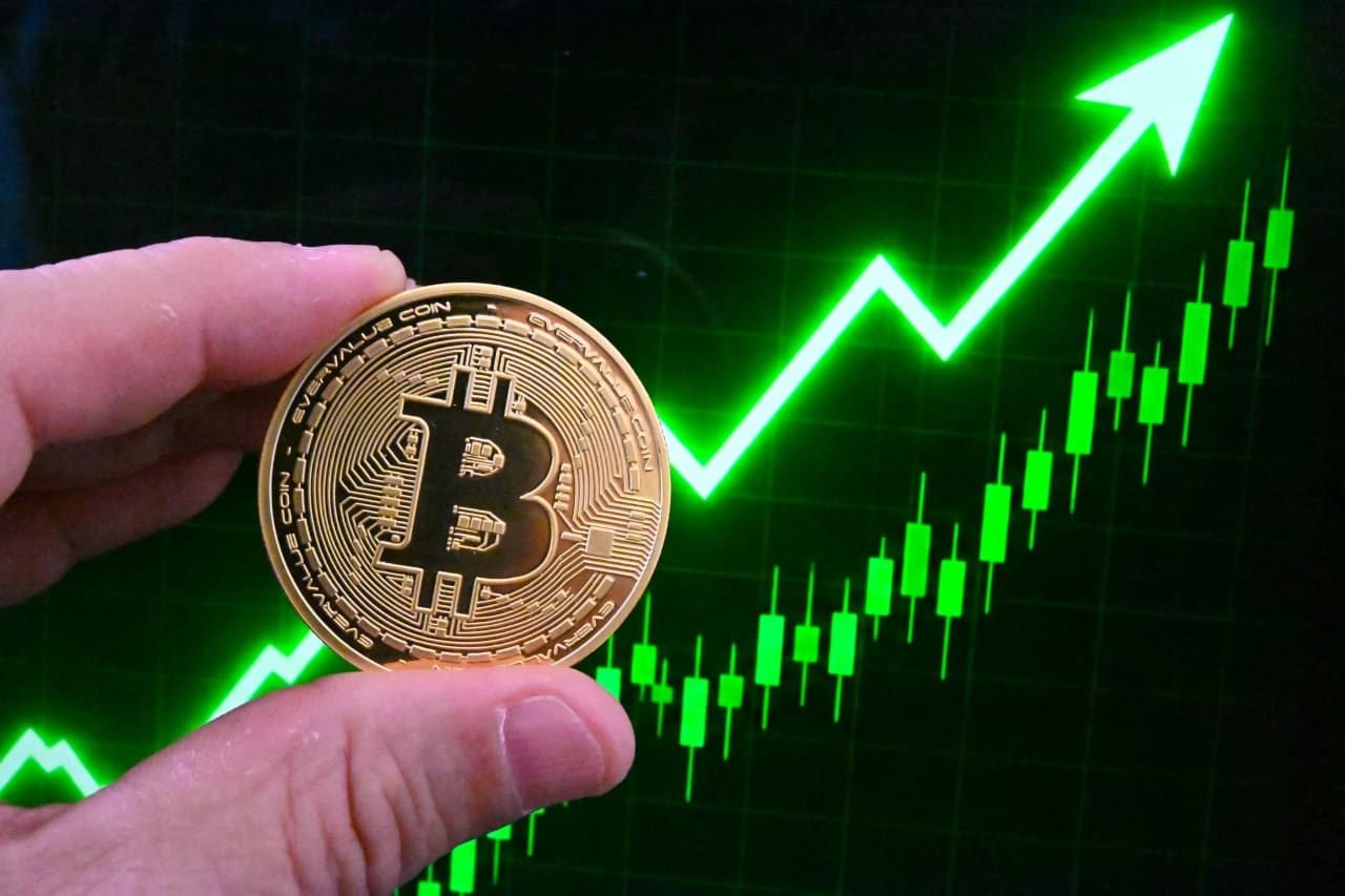 Source-feed image associated with Bitcoin has beaten stocks and gold over six months. Now it’s crossed the $80,000 mark.