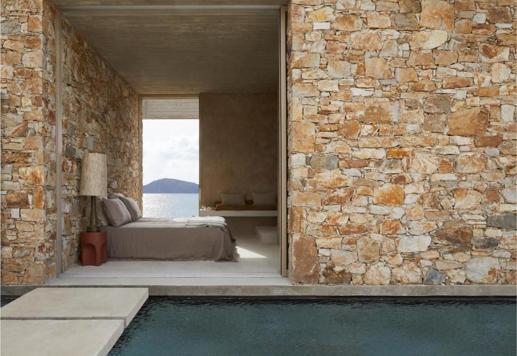 Source-feed image associated with The 23 Best Hotels on the Greek Islands to Book This Summer