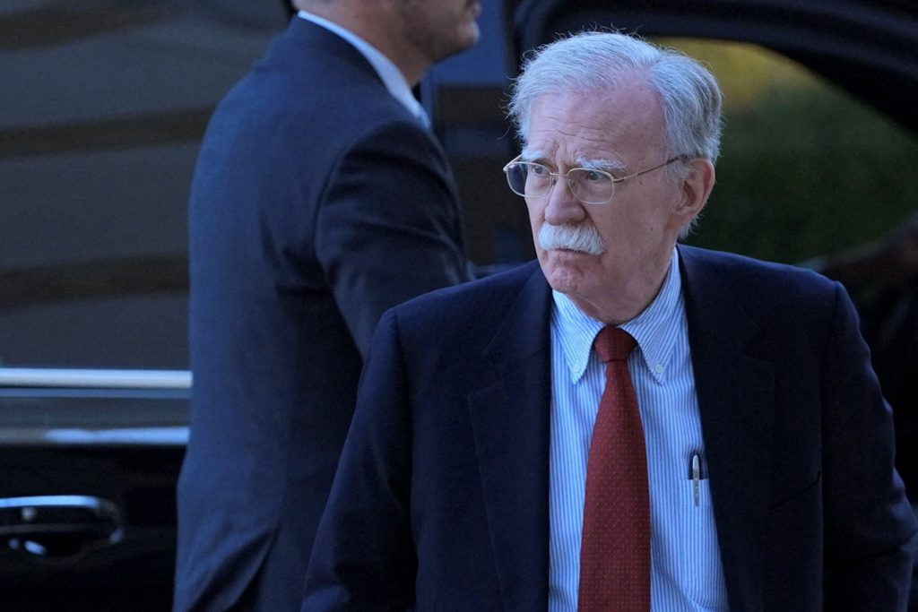 Source-feed image associated with News Wrap: Former Trump adviser John Bolton to plead guilty over classified information
